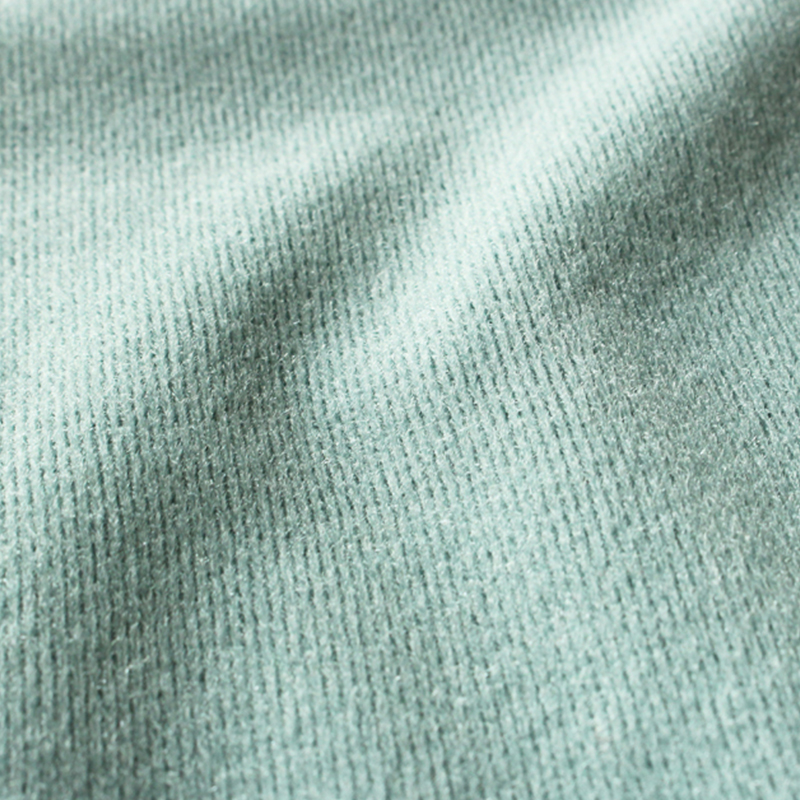 Tissu velours bouclé 100 % polyester.